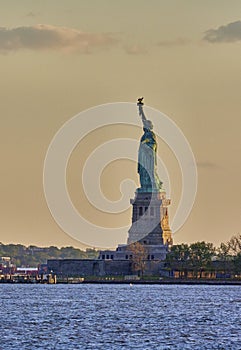 Sunset photography of Statue of Liberty at night in profile New York City, New York USA