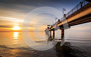 Sunset and pier in Miedzyzdroje