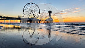 Sunset at the pier in Scheveningen Holland