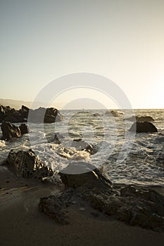 A sunset at Playa Conchas Chinas in Mexico