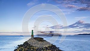 Sunset Poolbeg lighthouse in Ireland