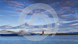 Sunset Poolbeg lighthouse in Ireland