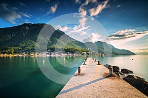 Sunset at Port Valais town with Swiss Alps near Montreux, Switzerland, Europe photo