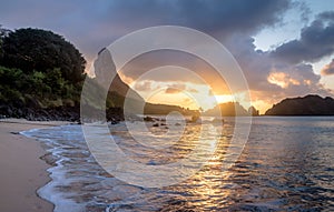 Sunset at Praia do Cachorro Beach with Morro do Pico on background - Fernando de Noronha, Pernambuco, Brazil