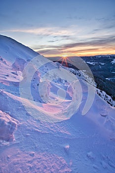 Sunset from Prasiva mountain in Low Tatras during winter