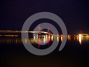 Sunset at the Puente de la Constitucion, called La Pepa, in the bay of Cadiz, Andalusia. Spain. photo