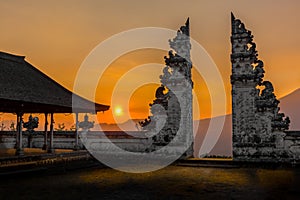 Sunset at the Pura Lempuyang Luhur Temple, known as the Gates of Heaven, with mount batur in background in Bali, Indonesia, Asia