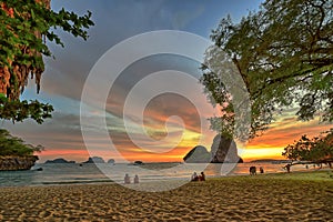 Sunset on the Railay beach in Thailand photo