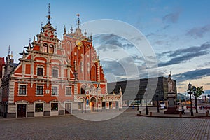 Sunset at Ratslaukums square with the House of Blackheads in old