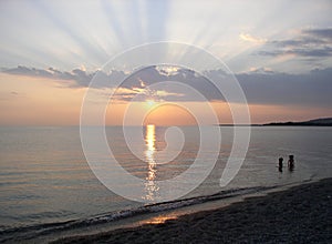 Sunset Rays Beach Scene on the Mediterranean Sea