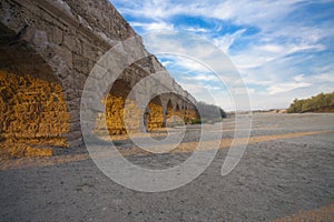 Sunset rays of light on aqueduct