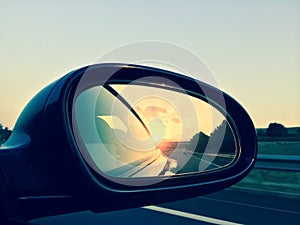 Sunset in a rear view mirror