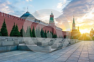 Sunset at Red Square in Moscow with Kremlin towers, wall and Mausoleum