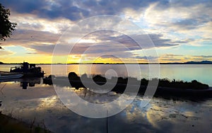 Sunset reflected in the western lagoon of Orbetello