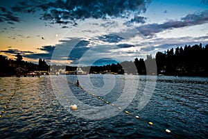 Sunset Reflection At Meydenbauer Beach Park In Between Swimming Lanes In Bellevue, Washington, United States