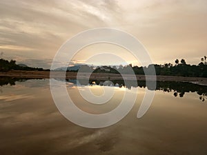 Sunset Reflection At River