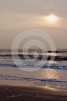 Sunset and reflection of the sun at the north sea, Netherlands