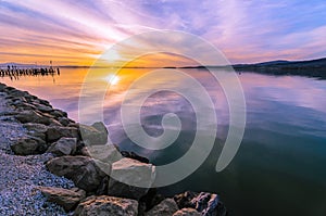 Sunset reflection in the waters of the Trasimeno lake, Umbria, I photo