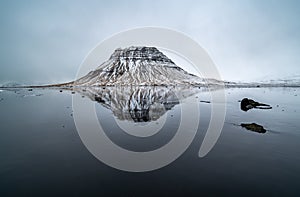 Sunset and reflections on the beautiful Kirkjufell mountain, Snaefellsness peninsula, Iceland