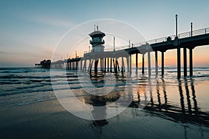 Sunset reflections and the pier in Huntington Beach, Orange County, California