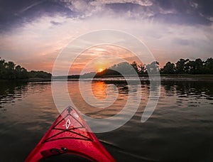 Sunset on river in kayak