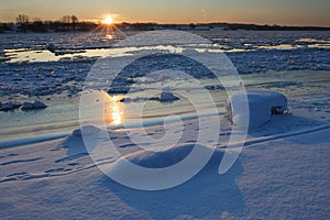 Sunset river in winter