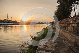Sunset from riverbank Mae Klong river in Ratchaburi Thailand