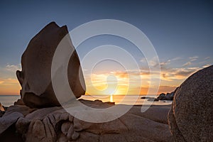 Sunset in a rocky bay on the Capo Testa peninsula in Sardinia