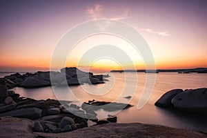 Sunset from rocky coastline of Cavallo Island in Corsica