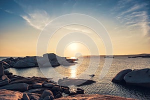 Sunset from rocky coastline of Cavallo Island in Corsica