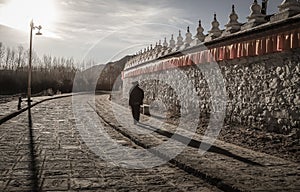 Sunset at the Samye Monastery with Pilgrim, Tibet photo