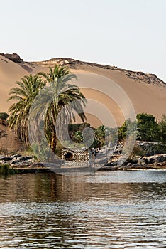 Sunset, Sand dunes on the Coastline of the Nile river part called First Cataract, Aswan Egypt