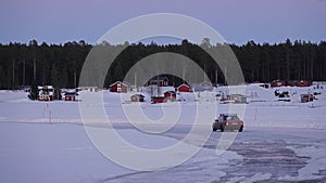 Sunset at Sandon island iceroad  in Lulea archipelago in Sweden