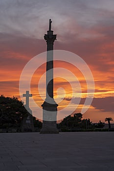 Sunset at Santa Maria di Leuca. Santa Maria di Leuca, Colonna Corinzia - Salento, Lecce, Apulia, Italy . Religious symbol,