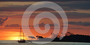 Sunset scene over the Arafura Sea and Red Island Seisia Cape York Australia photo