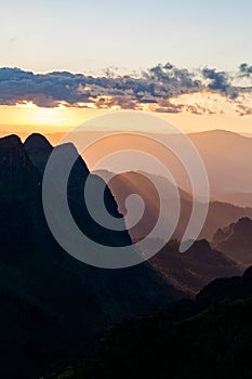 Sunset scene with silhouette mountain