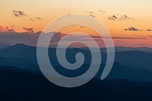 Sunset scene with silhouette mountain at Doi Luang Chiang Dao