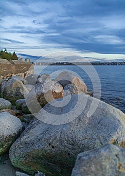 Sunset scenic over the beach with rocks. Beautiful sunset at the Pacific ocean Canada