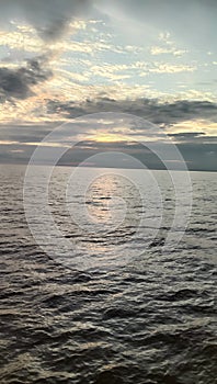 Sunset at sea be cover by cloud