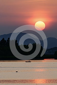 Sunset with sea and boat