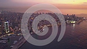 Sunset in the sea. Flying over Beirut Zaytunay bay marina and downtown. Drone aerial shot of Beirut, Lebanon, during sunset.