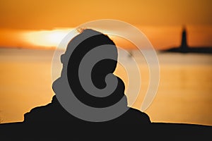 Sunset sea with a man