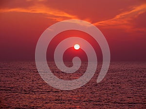 Sunset on the sea with solar path