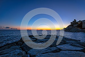 Sunset in the sea village with color huoses/ sunset/ Sun/houses/Genoa/Italy