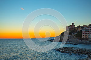 Sunset in the sea village with color huoses/ sunset/ Sun/houses/Genoa/Italy