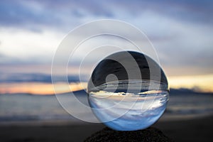 Sunset Seascape Captured in Glass Ball