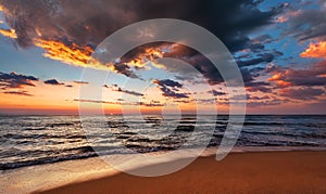 Sunset seascape with dramatic sky.