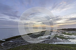 Sunset seascape of Olhao salt marsh Inlet waterfront