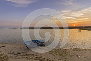 Sunset seascape view of Olhao salt marsh Inlet, Algarve.