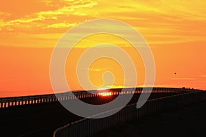 Sunset seen from a bridge